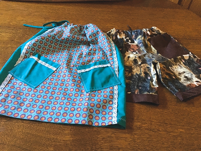 One of the dresses and pairs of shorts sewn by the “Little Dresses for Africa” group.
